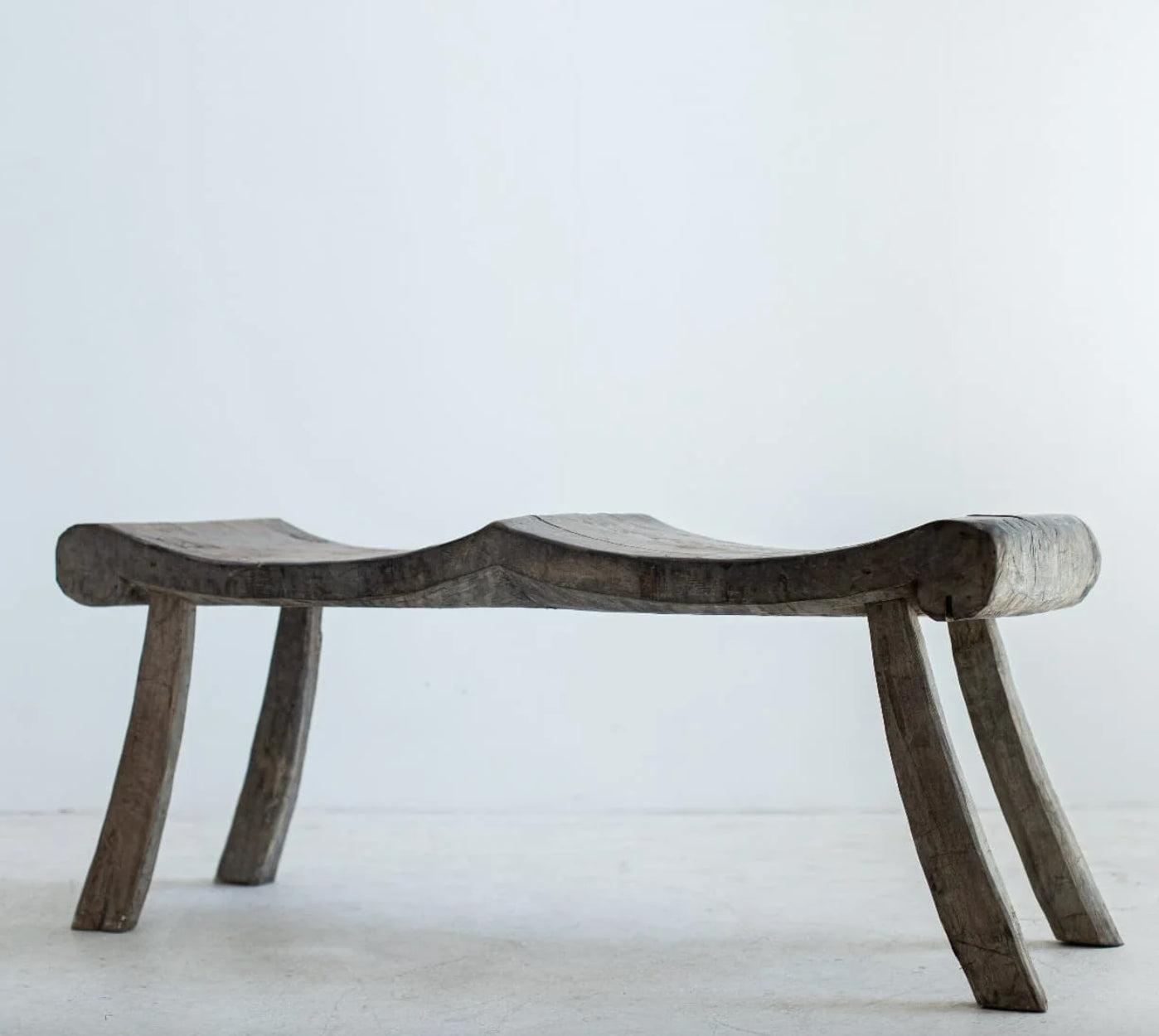 PRIMITIF BENCH TAPERED LEG CURVED SEAT