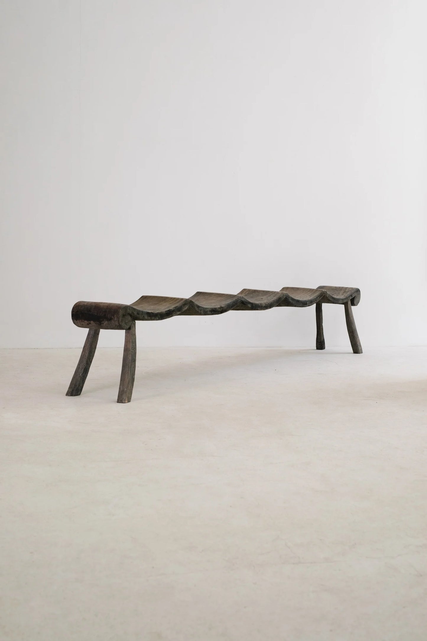 PRIMITIF BENCH TAPERED LEG CURVED SEAT