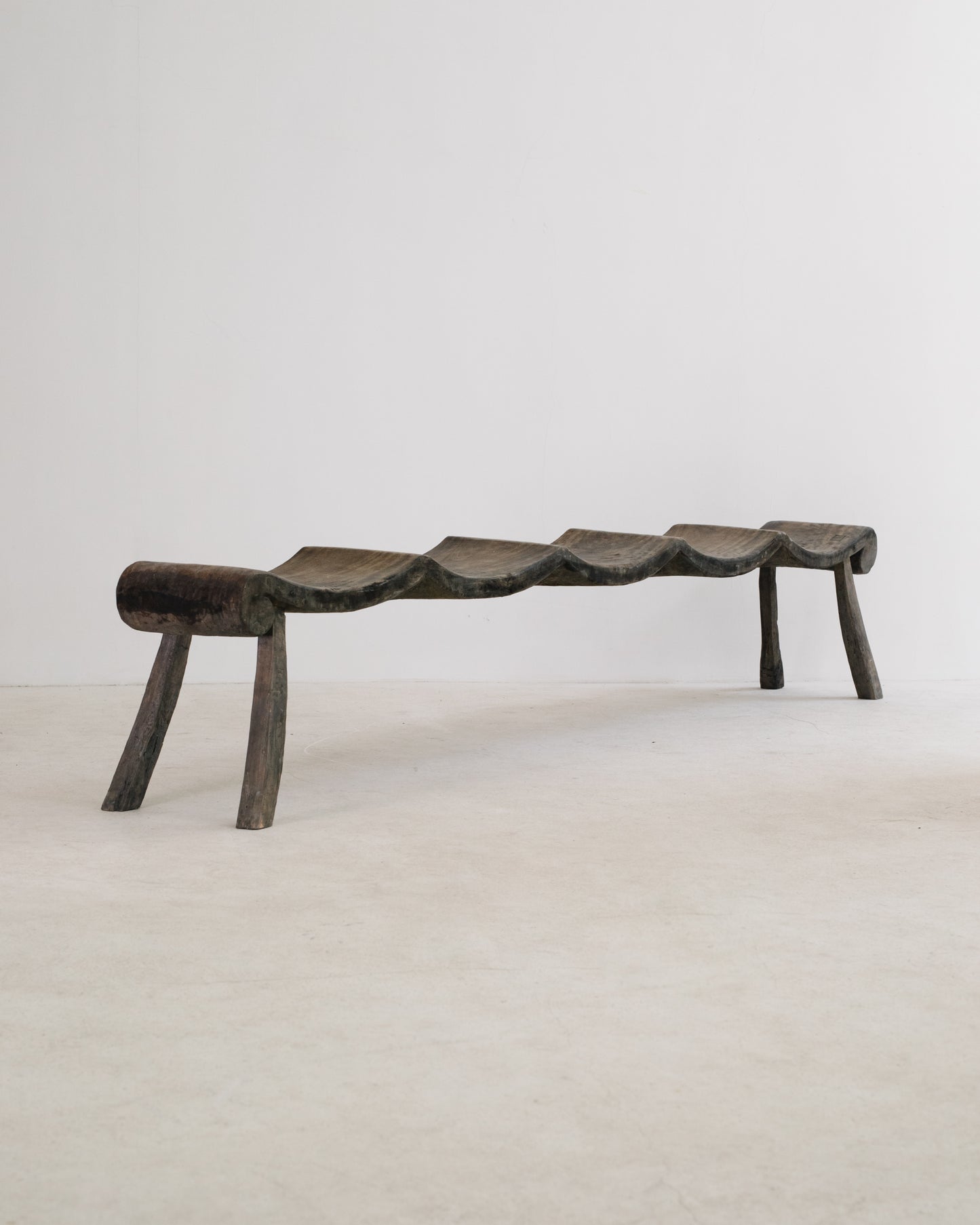 PRIMITIF BENCH TAPERED LEG CURVED SEAT