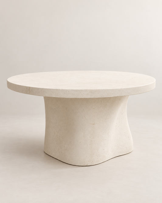 Sculptural Cream Stone Pedestal Table.png